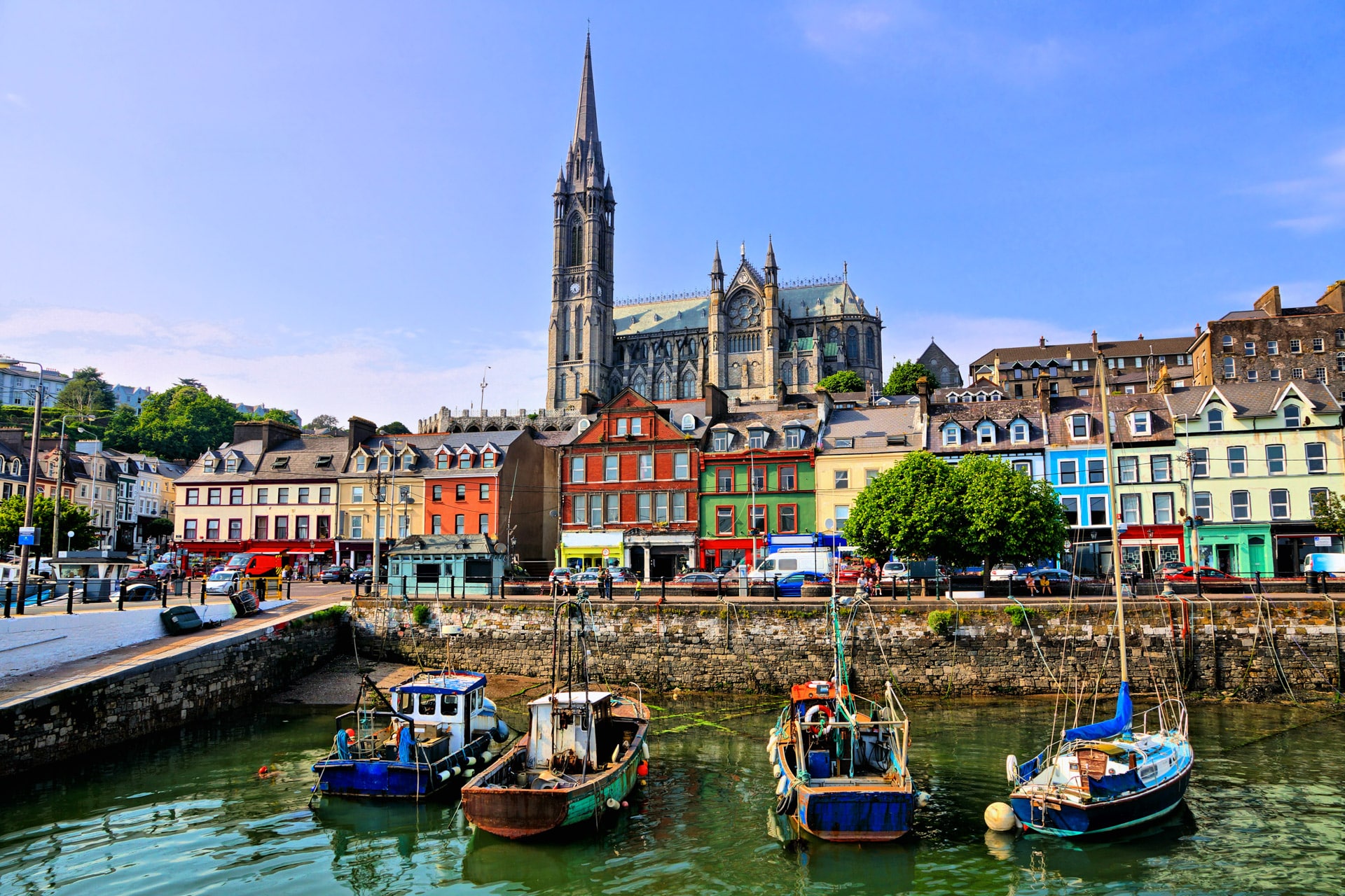 Cork city, with boats and church in the background